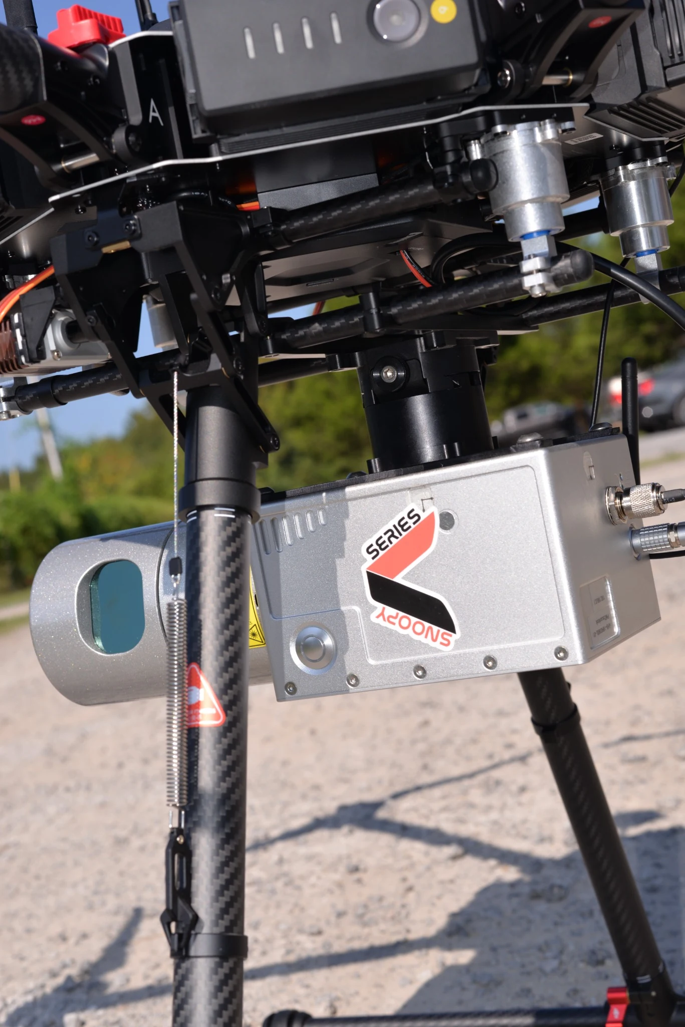 Detail of a silver Snoopy system mounted on a drone