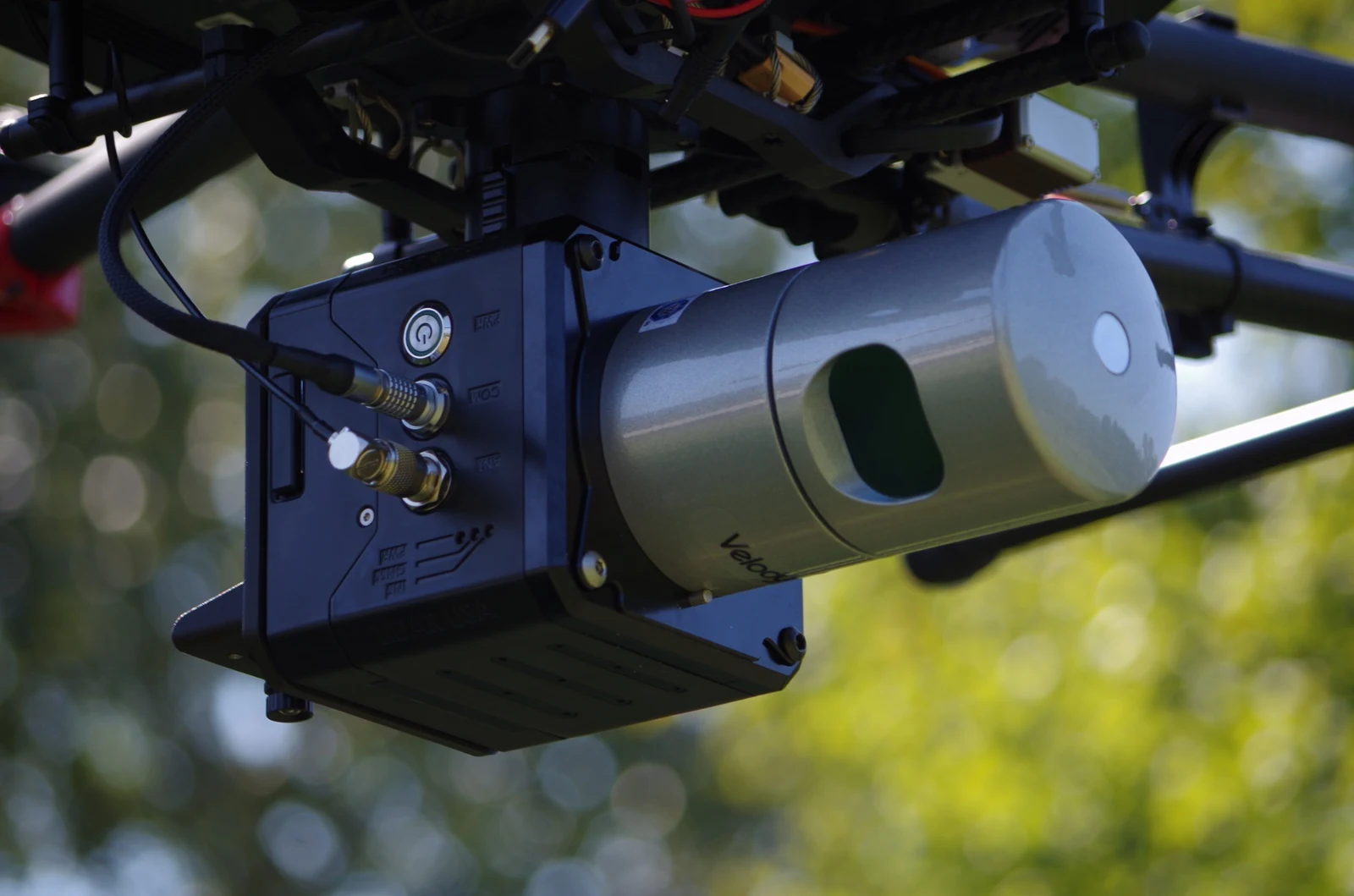 Close-up of a LiDARUSA mapping payload with cylindrical laser scanner